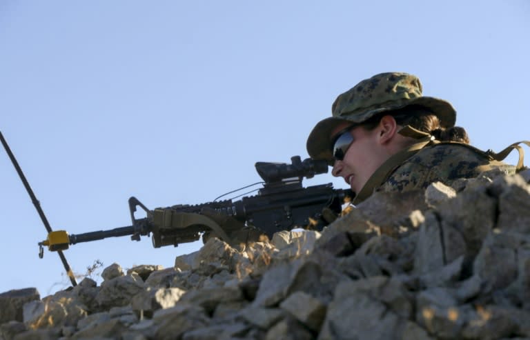 The first female Marine to become an infantry officer takes aim during training