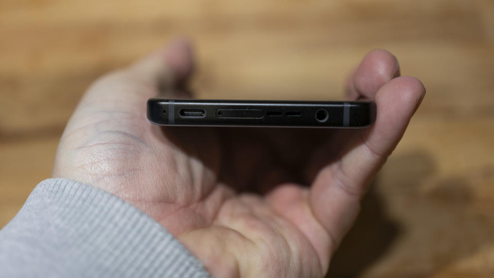 A silver ASUS ROG Phone 8 sitting on a table