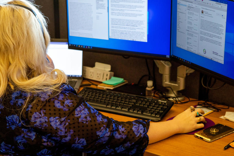 988 Mental Health Lifeline workers are pictured Wednesday, July 27, 2022.