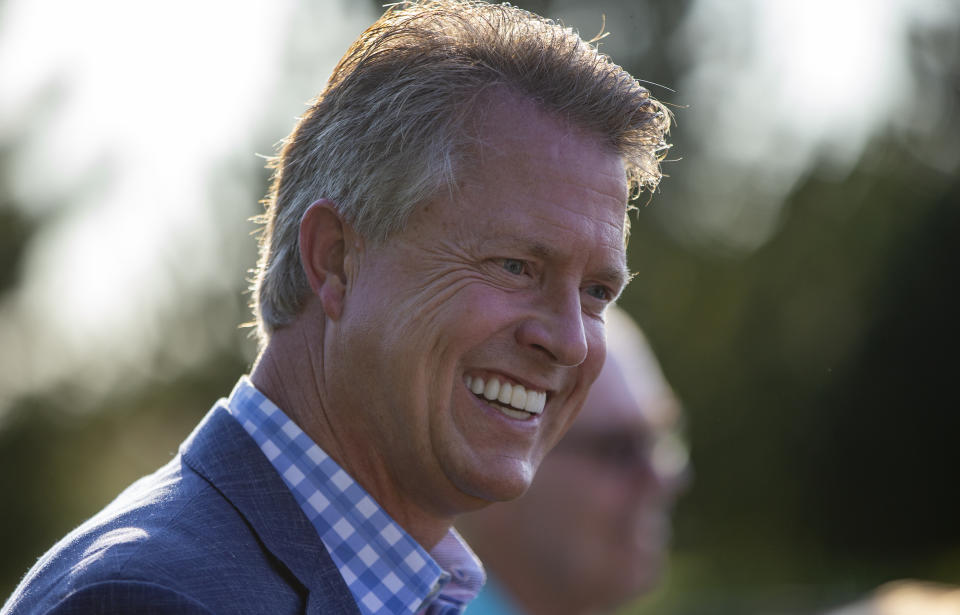 Republican congressman Roger Marshall of Kansas' 1st congressional district, speaks with supporters at his election night party at Rosewood Winery near Pawnee Rock, Ks., on Tuesday, Aug. 4, 2020. Marshall is running against former Kansas Secretary of State Kris Kobach for the Republican nomination to replace retiring Kansas senator Pat Roberts. (Travis Heying/The Wichita Eagle via AP)