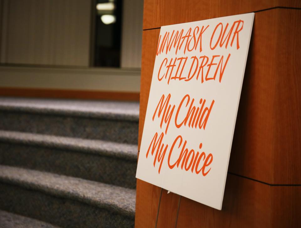 Some St. Clair County residents have spoken out against this month's K-12 COVID-19 mask order, including at a board meeting on Thursday, Jan. 6, 2022, when the pictured sign was posted by the public comment podium.