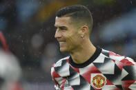 Manchester United's Cristiano Ronaldo stands on the pitch during warmup before the English Premier League soccer match between Aston Villa and Manchester United at Villa Park in Birmingham, England, Sunday, Nov. 6, 2022. (AP Photo/Rui Vieira)