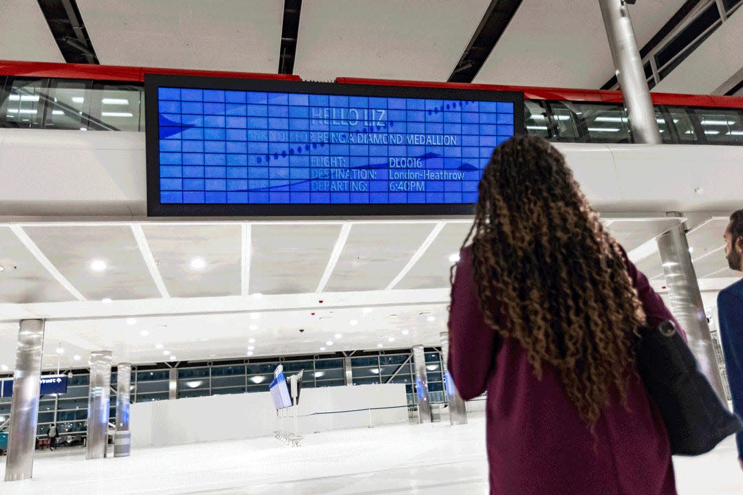 Delta and Parallel Reality's personalized flight info board at the Detroit Airport