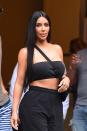 <p>Mrs. West kept things simple and chic for a recent New York City trip wearing superlong and straight center-parted hair, bold brows, and nude lips. (Photo: Getty Images) </p>