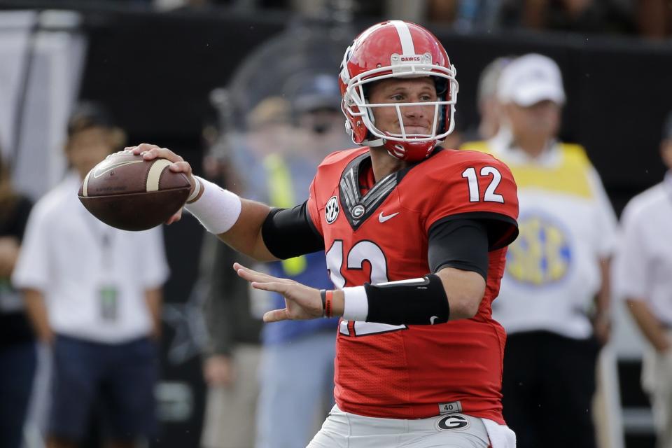 Brice Ramsey has played both quarterback and punter at Georgia. (AP Photo/Mark Humphrey)