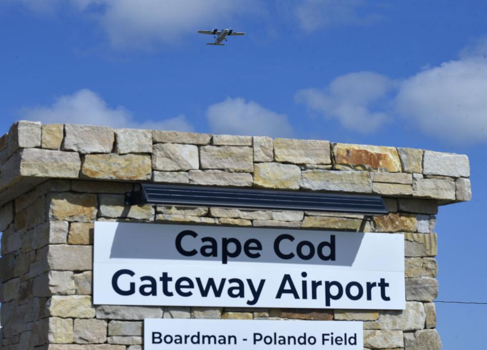 A commercial aircraft takes off on Runway 15/33 heading southwest seen from the entrance to the Cape Cod Gateway Airport's east ramp entrance on June 21, 2023, in Hyannis. American Airlines announced it will offer flights to and from the airport in June.