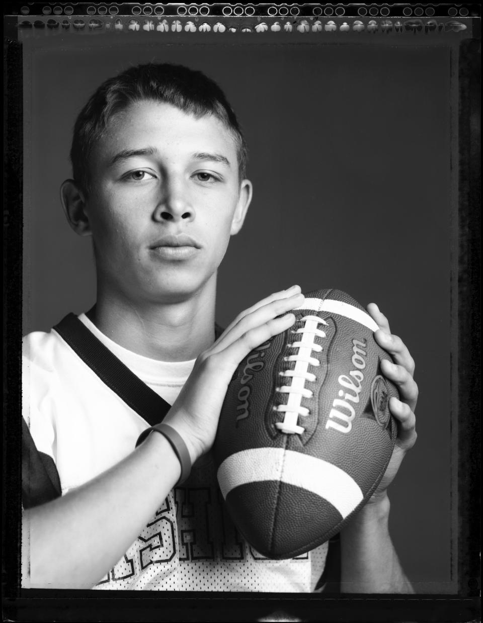 Cashion football player Cayden Cochran poses for a photo at the OPUBCO studio in Oklahoma City, Monday, August 6, 2007. This photo was made with a Sinar Norma 4x5 view camera on Polaroid Type 55 film. By Nate Billings, The Oklahoman