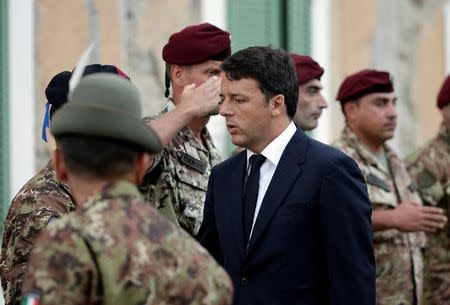 Italian Prime Minister Matteo Renzi arrives prior to a funeral service for victims of the earthquake that levelled the town in Amatrice, central Italy, August 30, 2016. REUTERS/Max Rossi