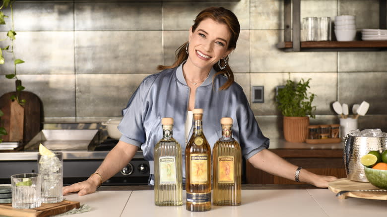 Pati Jinich with tequila bottles