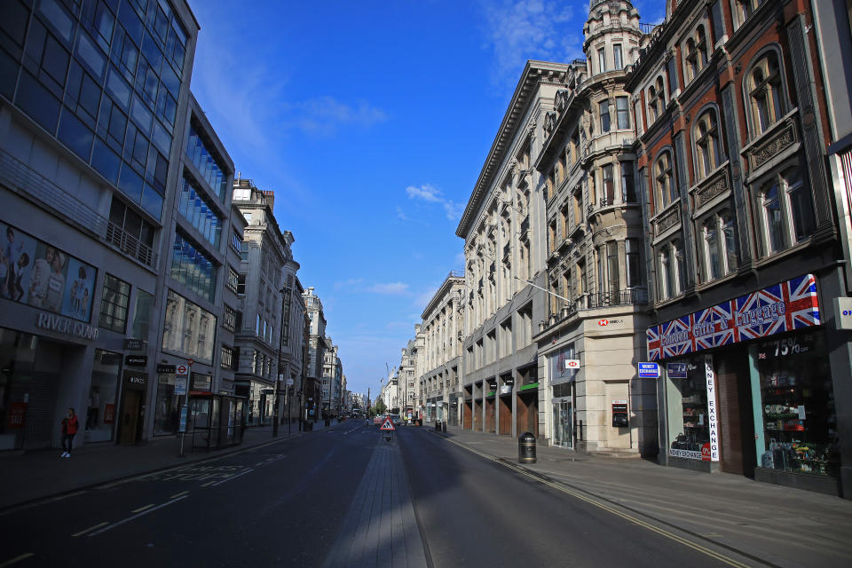 LONDON, ENGLAND  - APRIL 17: A general view of a deserted Oxford Street on April 17, 2020 in London, England. In a press conference on Thursday, First Secretary of State Dominic Raab announced that the lockdown will remain in place for at least 3 more weeks. The Coronavirus (COVID-19) pandemic has spread to many countries across the world, claiming over 130,000 lives and infecting more than 2 million people. (Photo by Andrew Redington/Getty Images)