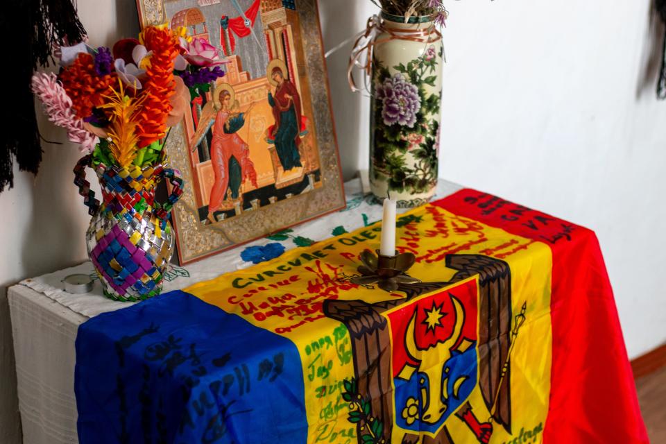 shrine with candle and flag of Moldova