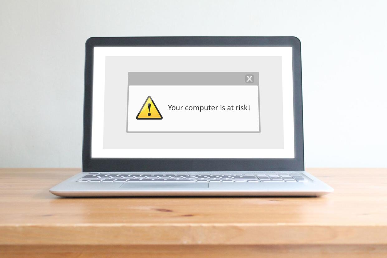 A warning message on a laptop screen