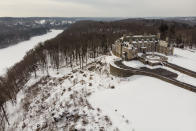 FILE - The Seven Springs, a property owned by former U.S. President Donald Trump, is covered in snow, Tuesday, Feb. 23, 2021, in Mount Kisco, N.Y. The New York attorney general, Tuesday, Jan. 18, 2022, says her investigators have uncovered evidence that former President Donald Trump's company used "fraudulent or misleading" valuations of its golf clubs, skyscrapers and other property to get loans and tax benefits. (AP Photo/John Minchillo, File)