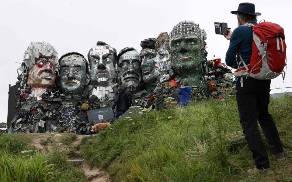 G7 leaders heads - ADRIAN DENNIS/AFP