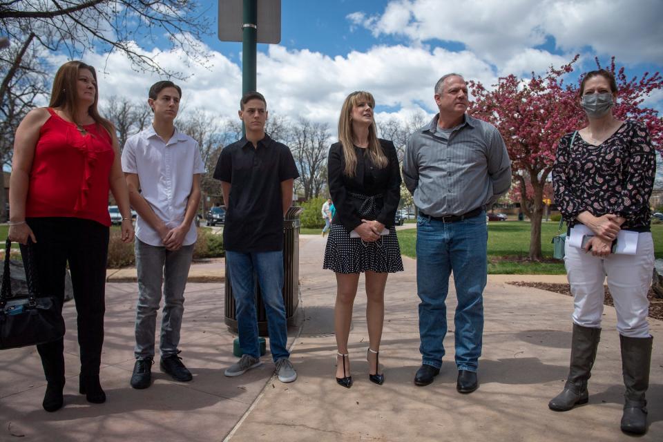 Karen Garner's family speaks with reporters outside the Larimer County Justice Center before attending the sentencing of former Loveland officer Austin Hopp on Thursday.