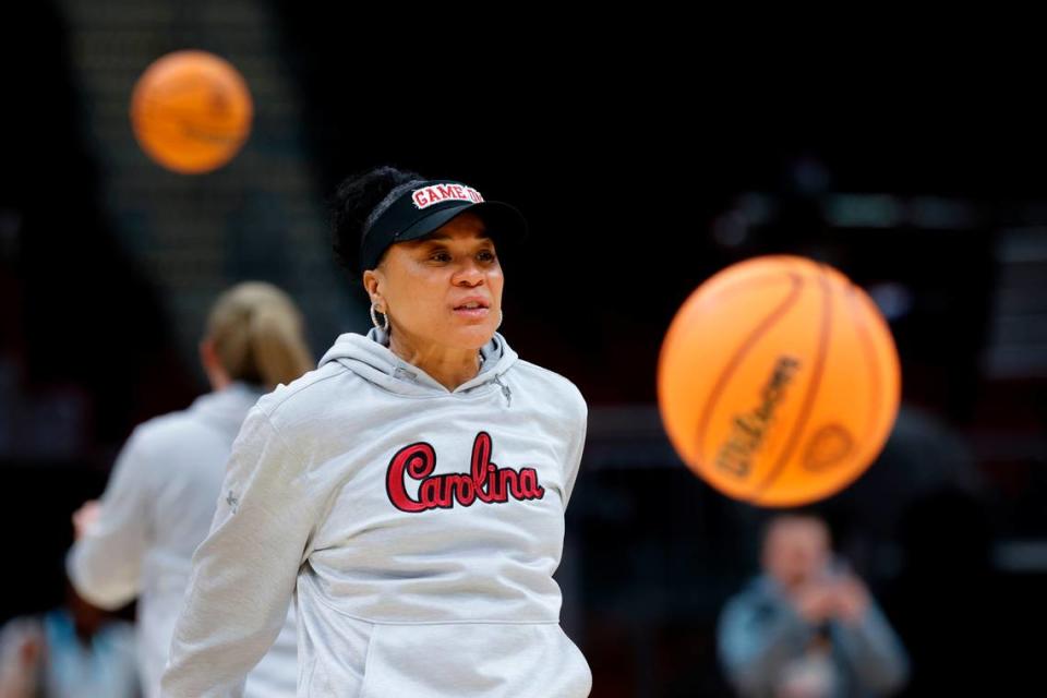 University of South Carolina Head Coach Dawn Staley works with her team during practice in the Rocket Mortgage Field House in Cleveland, Ohio on Thursday, April 4, 2024.