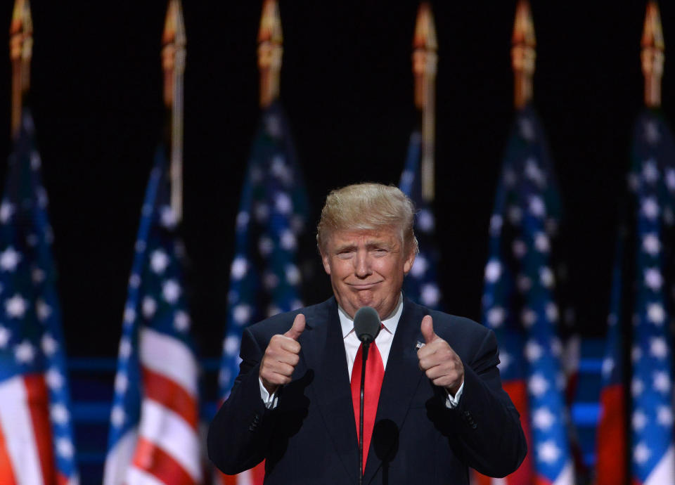 BEIJING, Nov. 9, 2016 -- File photo taken on July 21, 2016 shows Donald Trump taking the stage on the last day of the Republican National Convention in Cleveland, Ohio, the United States.    Former real estate tycoon Donald Trump has been elected the 45th president of the United States after a neck-and-neck race with his Democratic rival Hillary Clinton.     Born on June 14, 1946, in New York, Trump started his career in his father's real estate firm in 1968 after graduation from Wharton School of the University of Pennsylvania, and was given control of the company in 1971, when he renamed the company "The Trump Organization."     Since then, Trump expanded the business by building casinos, golf courses, hotels and other properties and started marketing his name on a number of building projects and commercial products and services.     He was also famous as a reality television star as the host of his 14-season run "The Apprentice."     Trump announced his presidential candidacy in June 2015, portraying himself as a Washington outsider. The announcement ended his long history of presidential flirtations that started in 1987 and were revived in 2000, 2004, 2008 and 2012 elections.(Xinhua/Yin Bogu via Getty Images)