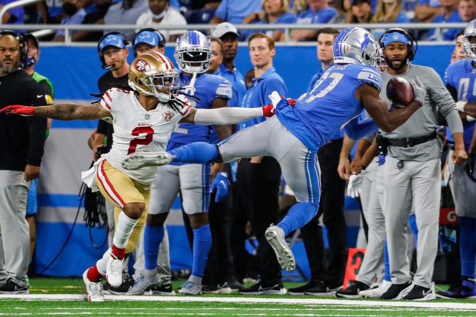 Detroit Lions wide receiver Quintez Cephus (87) makes a catch against San Francisco 49ers cornerback Jason Verrett (2) during the second half at Ford Field in Detroit on Sunday, Sept. 12, 2021.