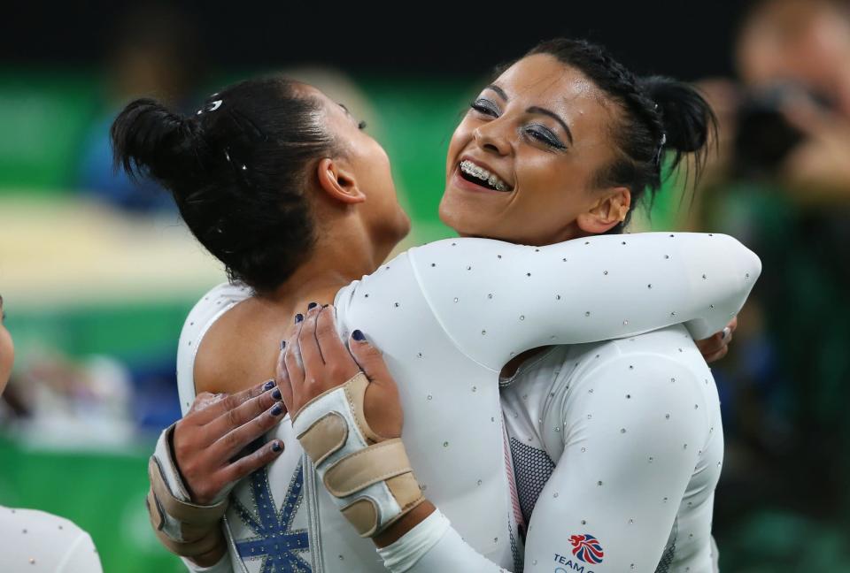 <p>Ellie Downie of Great Britain hugs her sister Becky Downie after completing the Vault during the Artistic Gymnastics Women’s Team Final on Day 4 of the Rio 2016 Olympic Games at the Rio Olympic Arena on August 9, 2016 in Rio de Janeiro, Brazil. (Photo by Alex Livesey/Getty Images) </p>