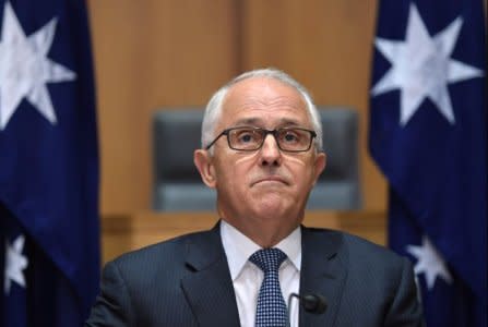 Australian Prime Minister Malcolm Turnbull listens to a question during a news conference after a meeting of the Council of Australian Governments (COAG) at Parliament House in Canberra, Australia, October 5, 2017. AAP/Lukas Coch/via REUTERS