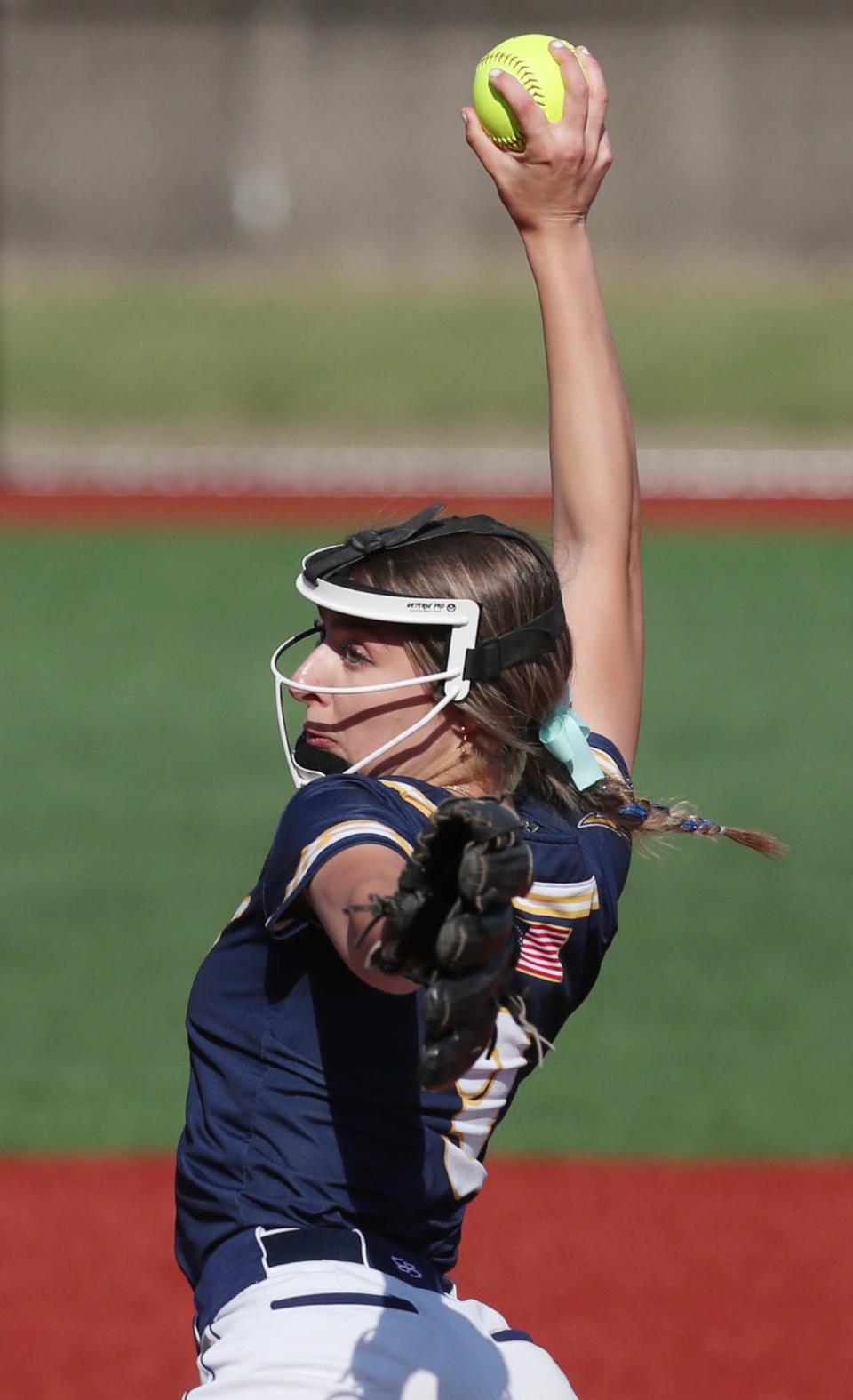 Tallmadge’s starting pitcher Riley Jackson delivers a pitch against Greenville in the Div. II state semifinal softball at Firestone Stadium in Akron.