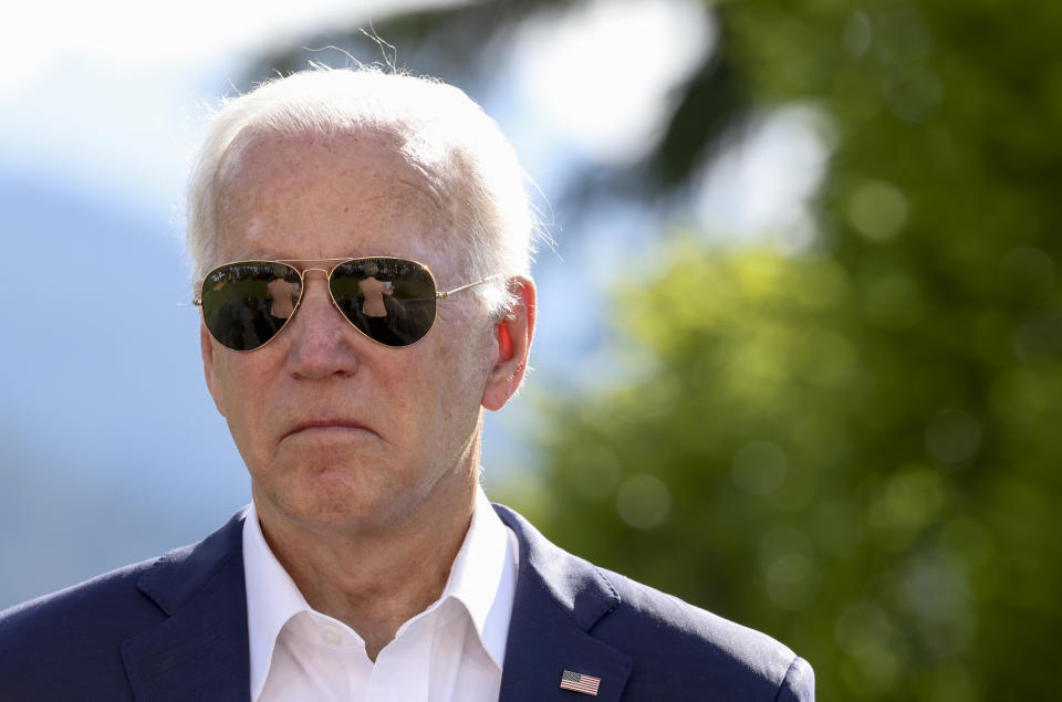 European Commission President Ursula von der Leyen is reflected in U.S. President Joe Biden's sunglasses during the first day of the G7 leaders' summit at Bavaria's Schloss Elmau castle, near Garmisch-Partenkirchen, Germany, Sunday, June 26, 2022. (Lukas Barth/Pool photo via AP)