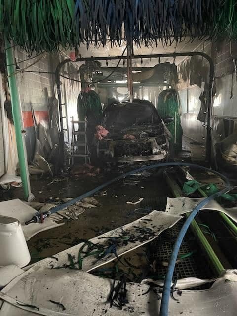 A minivan caught fire in the Rainforest Car Wash on Medina Road on Friday.