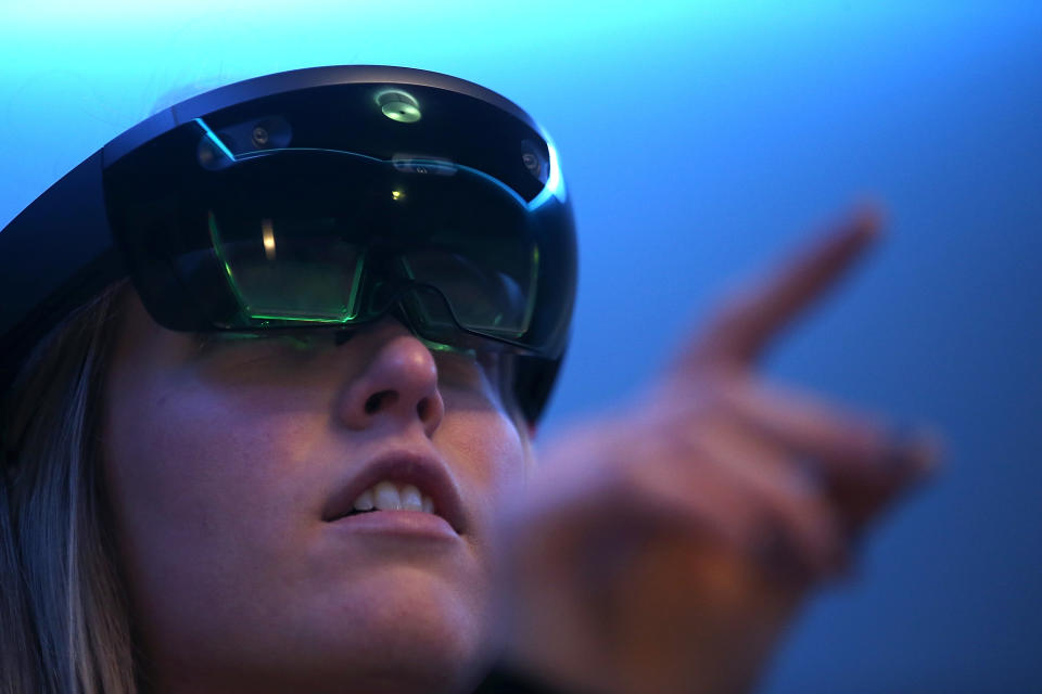 SAN FRANCISCO, CA - MARCH 30: Microsoft employee Gillian Pennington demonstrates the Microsoft HoloLens augmented reality (AR) viewer during the 2016 Microsoft Build Developer Conference on March 30, 2016 in San Francisco, California. The Microsoft Build Developer Conference runs through April 1. (Photo by Justin Sullivan/Getty Images)