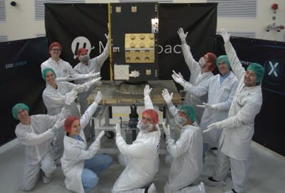 Muon Space’s satellite integration team with MuSat2 at Vandenberg Space Force Base launch site.