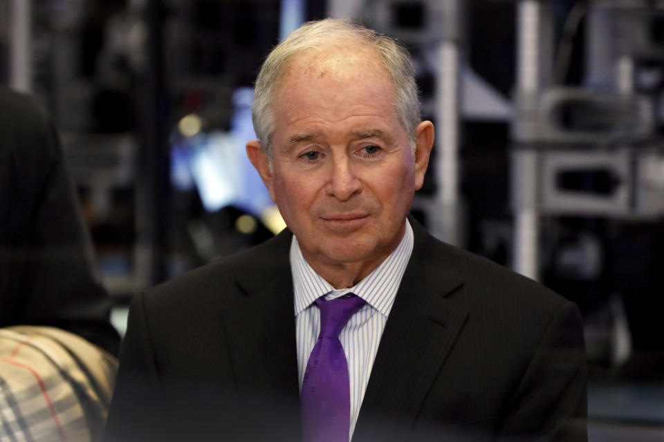 Stephen Schwarzman, chairman, CEO and co-founder of the investment firm Blackstone, waits to be interviewed on the floor of the New York Stock Exchange, Tuesday, Oct. 8, 2019. (AP Photo/Richard Drew)