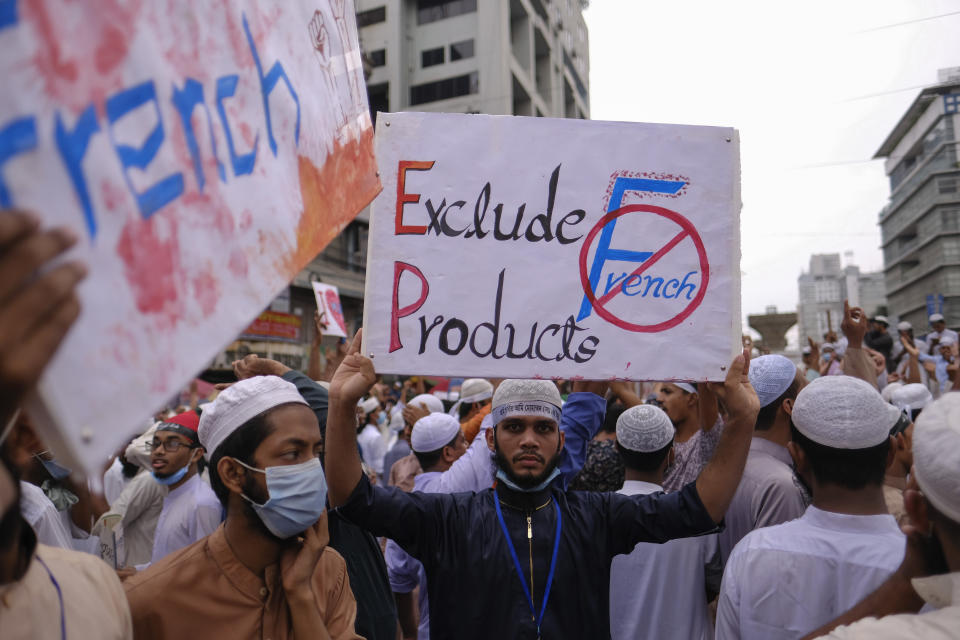 Bangladeshi Muslims protesting the French president’s support of secular laws allowing caricatures of the Prophet Muhammad march to lay siege on the French Embassy in Dhaka, Bangladesh, Monday, Nov.2, 2020. (AP Photo/Mahmud Hossain Opu)