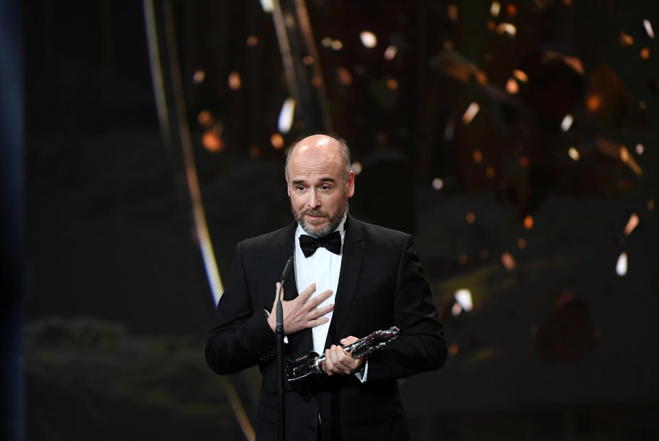FILE PHOTO: Director Jeremy Clapin receives the prize for animated feature film for the movie "I lost my body" during the 32nd European Film Awards in Berlin, Germany