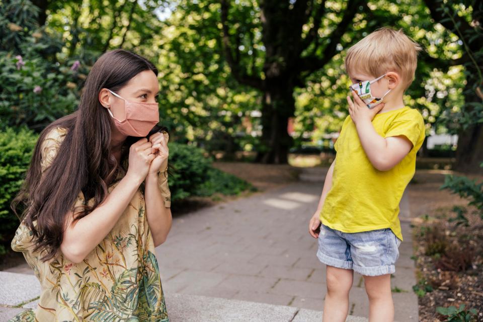 Rainbows, dinosaurs and tie-dye — there are lots of face masks for kids that they'll actually wear. (Westend61 via Getty Images)