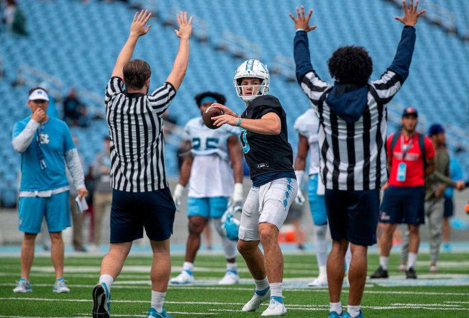 North Carolina quarterback Drake Maye (10) looks for an open receiver during the Tar Heels’ practice on Saturday, March 25, 2023 at Kenan Stadium in Chapel Hill. N.C.