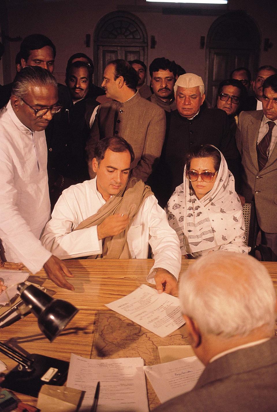 INDIA - MAY 10: Rajiv Gandhi filing Nomination Papers While Sonia Gandhi, P Shiv Shankar, ND Tiwari and other party leaders watching him ( Congress, News Portrait ) (Photo by Pramod Pushkarna/The The India Today Group via Getty Images)