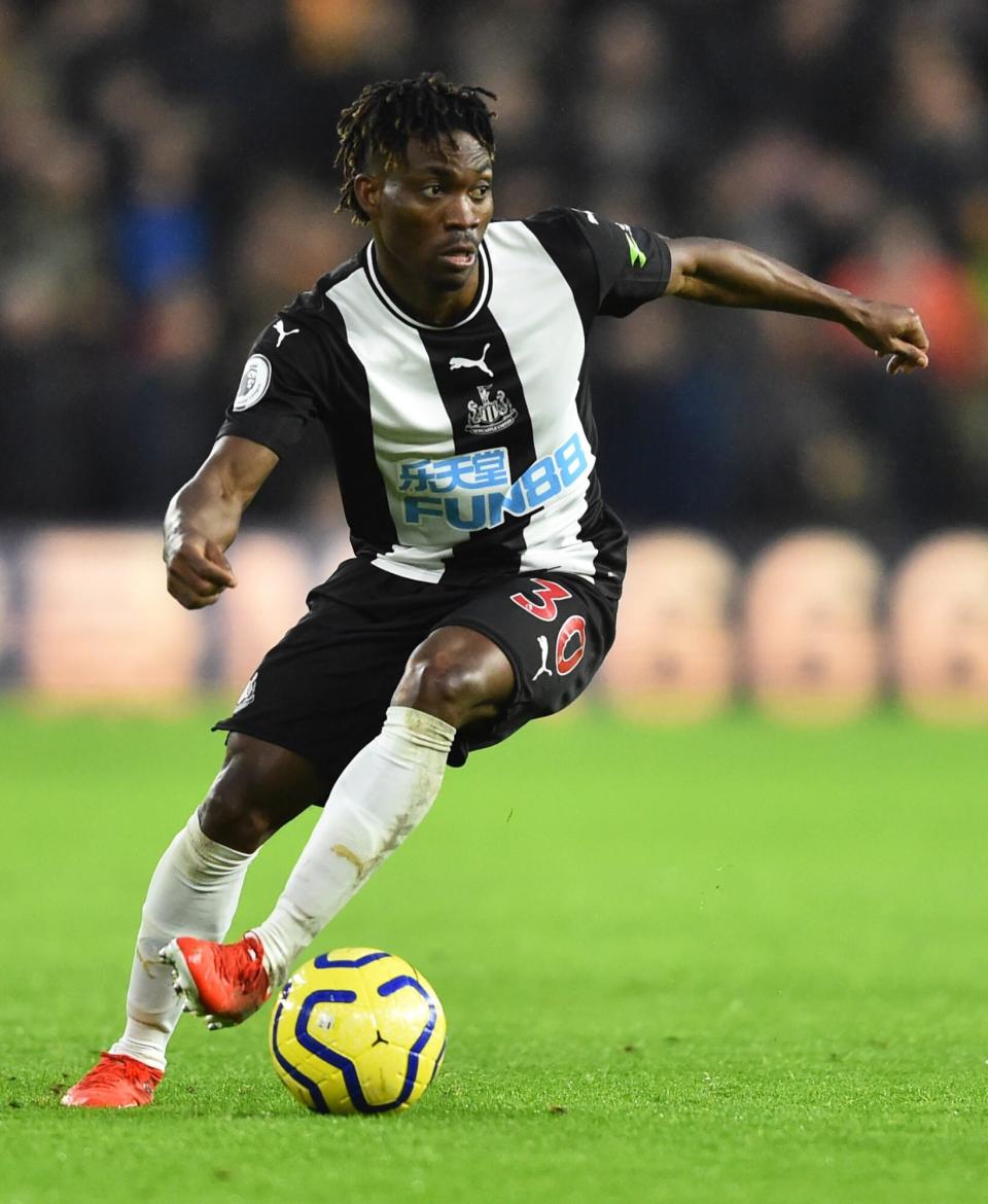 WOLVERHAMPTON, ENGLAND - JANUARY 11: Christian Atsu of Newcastle United controls the ball during the Premier League match between Wolverhampton Wanderers and Newcastle United at Molineux on January 11, 2020 in Wolverhampton, United Kingdom. (Photo by Nathan Stirk/Getty Images)