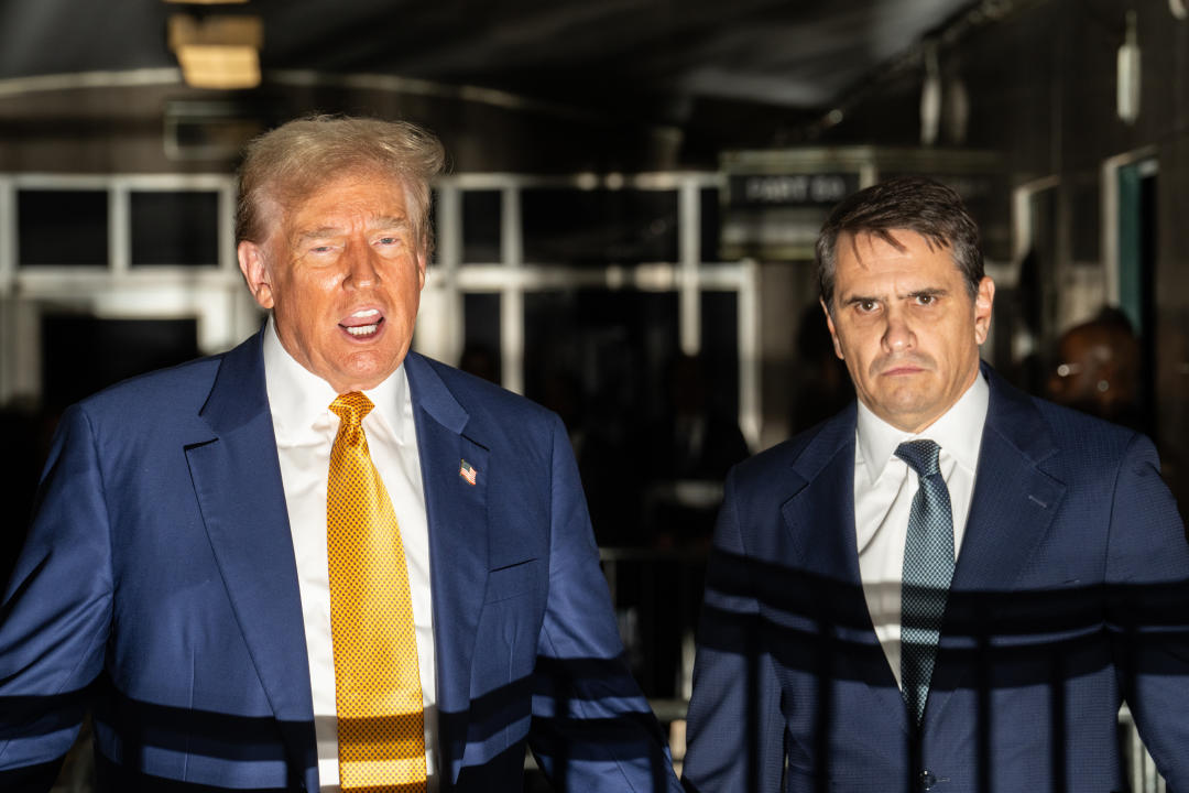 Trump speaks to the media outside of Manhattan Criminal Court on Thursday.