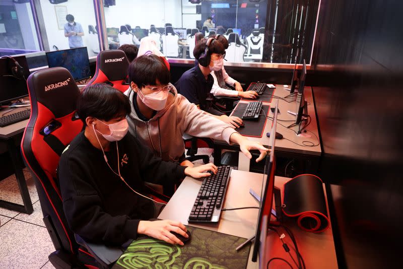 Yoon Ki-chan, majoring in esports, guides a friend as they play League of Legends during a class at Eunpyeong Meditech high school in Seoul, South Korea