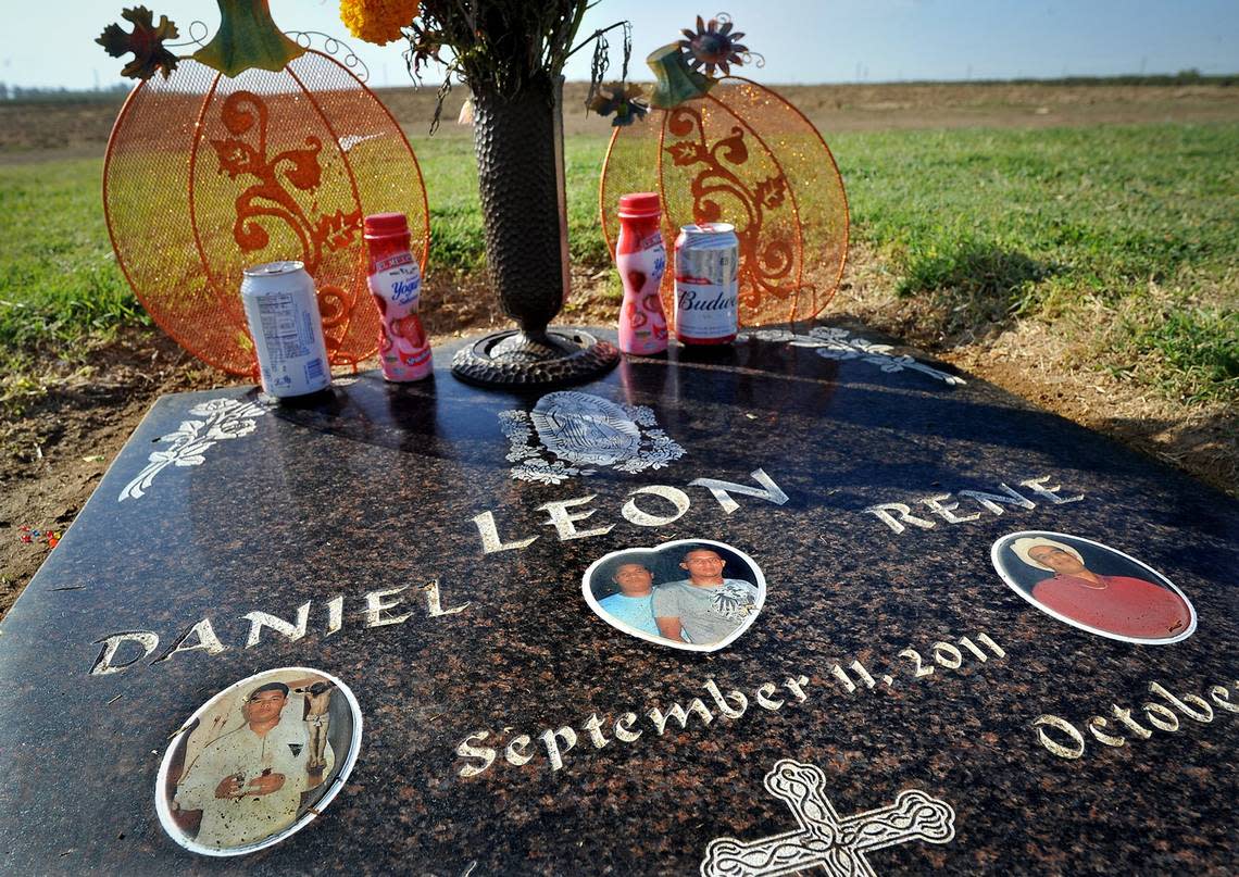 On the edge of farmland, the Fresno Memorial Gardens grave of the Leon brothers, Daniel and Rene, were reportedly the first victims of the MS-13 gang, killed in Mendota on Sept. 11, 2011. JOHN WALKER/jwalker@fresnobee.com