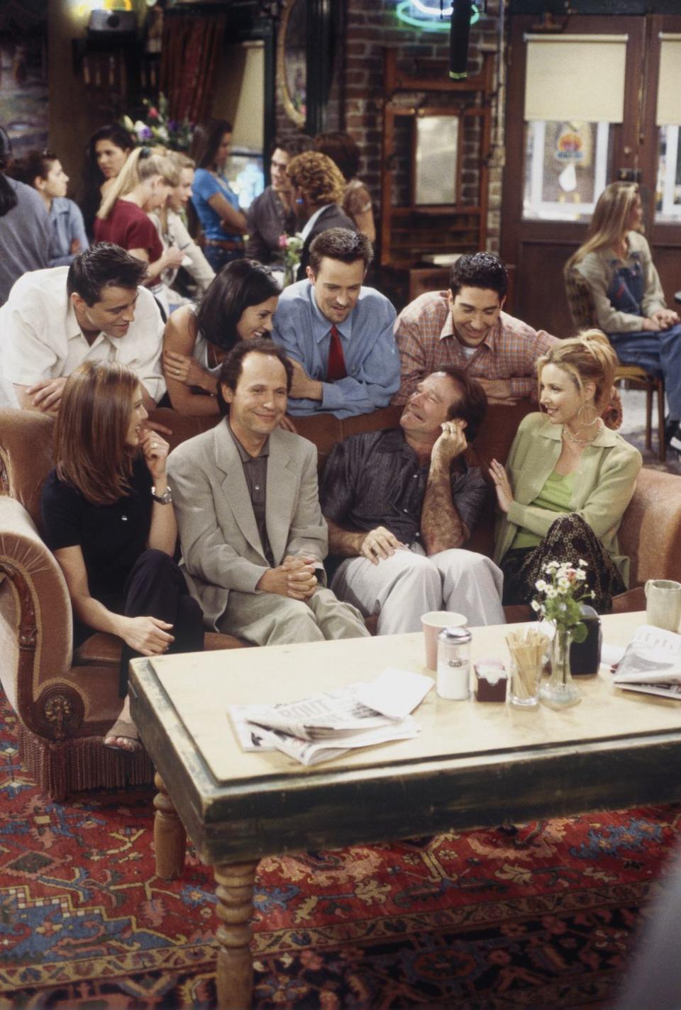 <p>It was by chance that Billy Crystal and Robin Williams happened to be on the same lot as <em>Friends</em> when the cast was filming "The One with the Ultimate Fighting Champion" in season 3. The comedians decided to stop by for a cup of coffee, during which an improvised conversation unfolds, leaving both the cast and audience in stitches.</p>