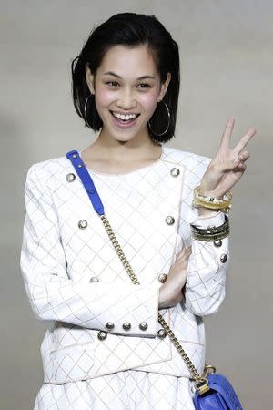 Japanese actress Kiko Mizuhara poses during a photocall before the German designer Karl Lagerfeld Spring/Summer 2015 women's ready-to-wear collection show for French fashion house Chanel during Paris Fashion Week September 30, 2014. REUTERS/Charles Platiau