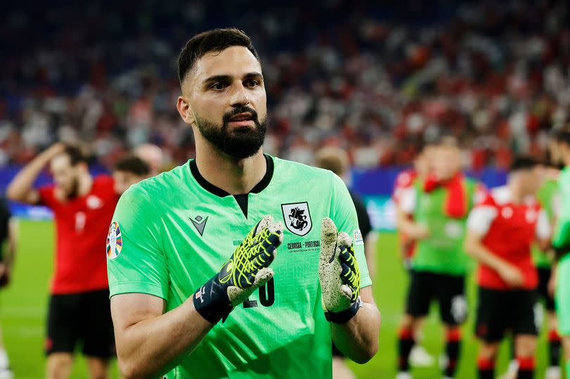 Giorgi Mamardashvili of Georgia celebrates the victory  during the  EURO match between Georgia  v Portugal  at the Veltins Arena on June 26, 2024 in Gelsenkirchen Germany.