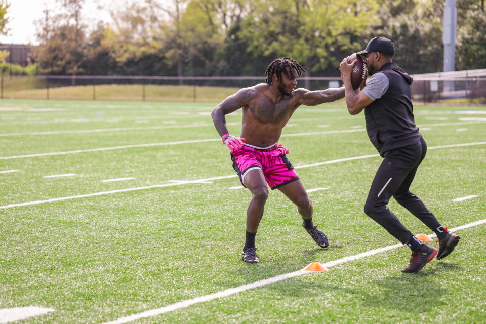 Levonta Taylor works with trainer Aaron Johnson at his pro day. (Photo courtesy of Jaterria Brickhouse/JB films) 