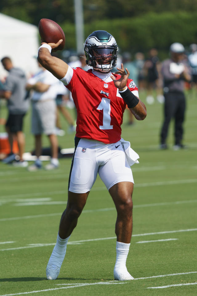 Philadelphia Eagles' Jalen Hurts, right, talks with a fan, left, during  practice at NFL football team's training camp, Wednesday, July 27, 2022, in  Philadelphia. (AP Photo/Chris Szagola Stock Photo - Alamy