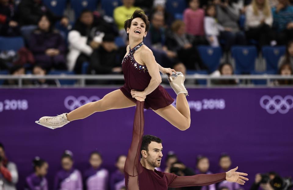 <p>Canada’s Meagan Duhamel and Canada’s Eric Radford compete in the figure skating team event pair skating free skating during the Pyeongchang 2018 Winter Olympic Games at the Gangneung Ice Arena in Gangneung on February 11, 2018. / AFP PHOTO / ARIS MESSINIS </p>