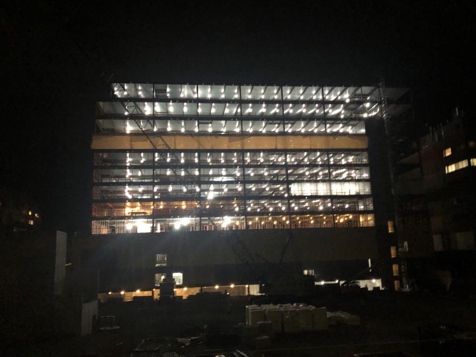 The first building of the CityPlace Burlington project seen from Cherry Street in Burlington, Vermont, is lit up at night on Thursday, Dec. 7, 2023.
