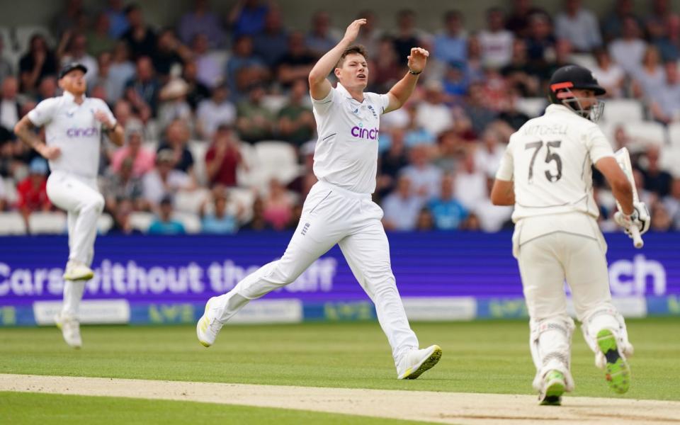 England's Matthew Potts (centre) reacts after the wicketkeeper drops a ball during day two  - Mike Egerton/PA