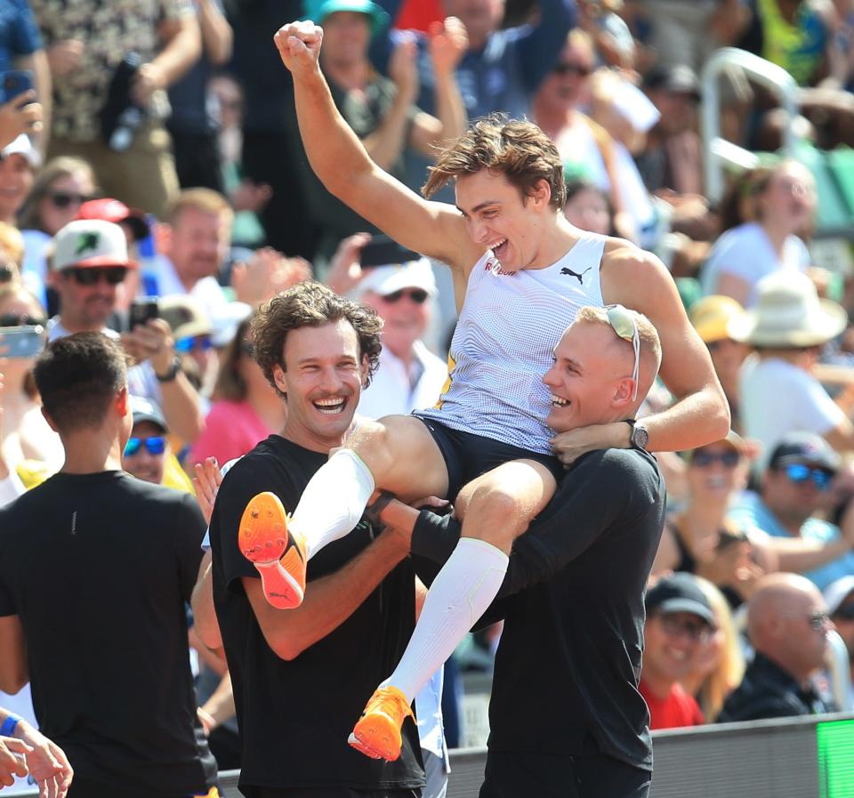 Fellow vultures lift Armand Duplantis in the air after he broke world record with a 6.23 meter jump on day two of the Prefontaine Classic at Hayward Field in Eugene, Ore. Sept. 17, 2023.