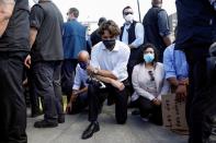 Canada's Prime Minister Justin Trudeau wears a mask as he takes part in a rally against the death in Minneapolis police custody of George Floyd, on Parliament Hill, in Ottawa