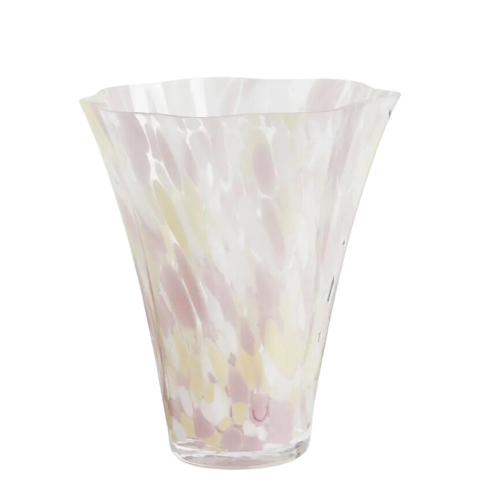 Glass vase with light pink and yellow specs and a rimmed tip